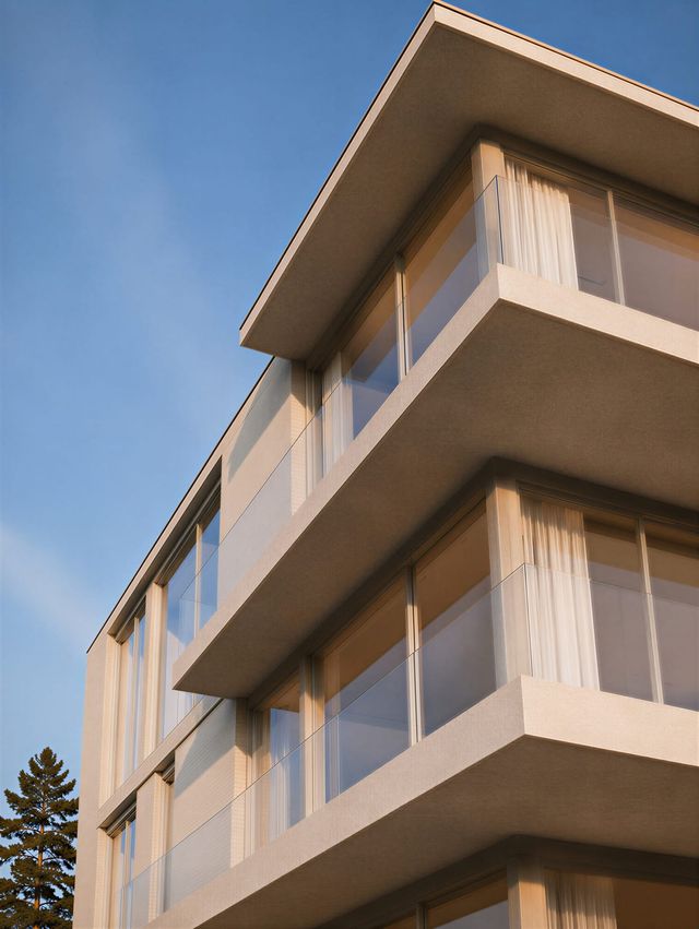 Residentie Verdure - detail van de uitkragende terrassen met transparante glazen balustrades en minimalistische raamprofielen